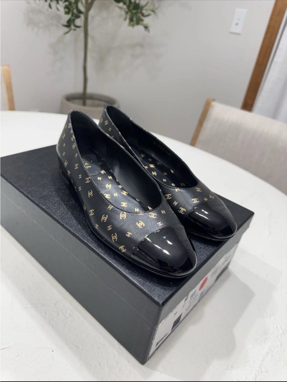 Chanel Black Ballet Flats with Gold Logo Accents